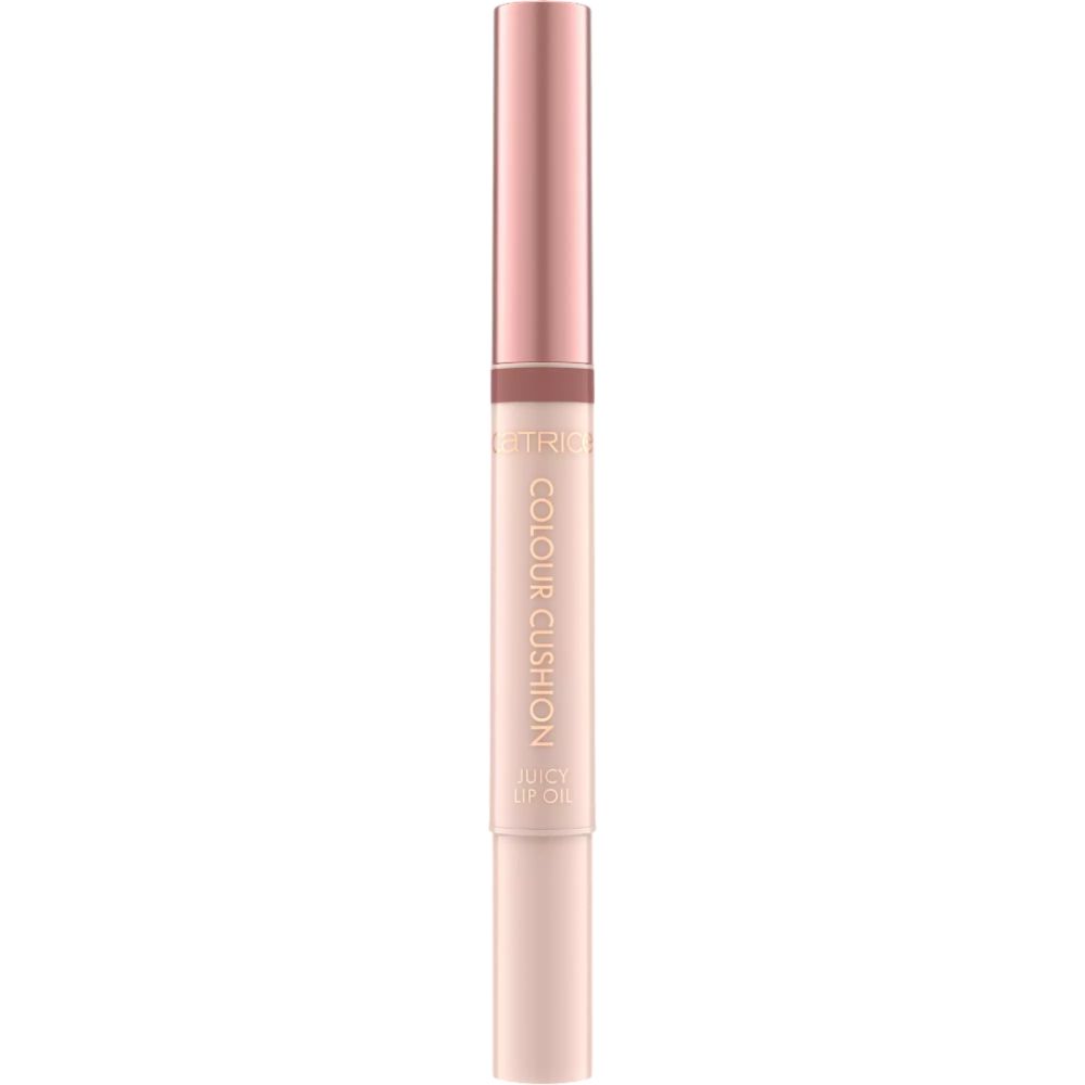 Lipolie pen. Tekst: COLOUR CUSHION JUICY LIP OIL. Roze pen met roze dop. Merk: CATRICE.