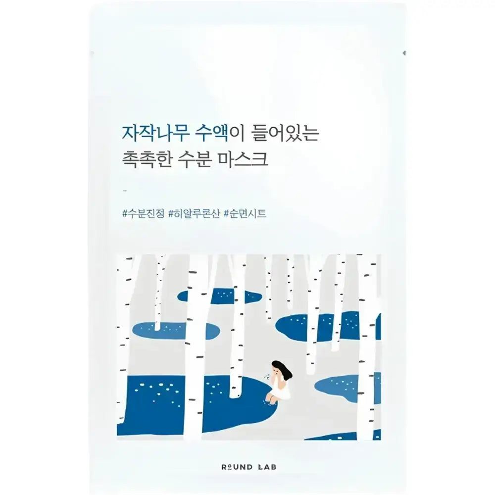 Emballage du masque en tissu. Blanc, avec design bleu. Texte coréen, logo : ROUND LAB.