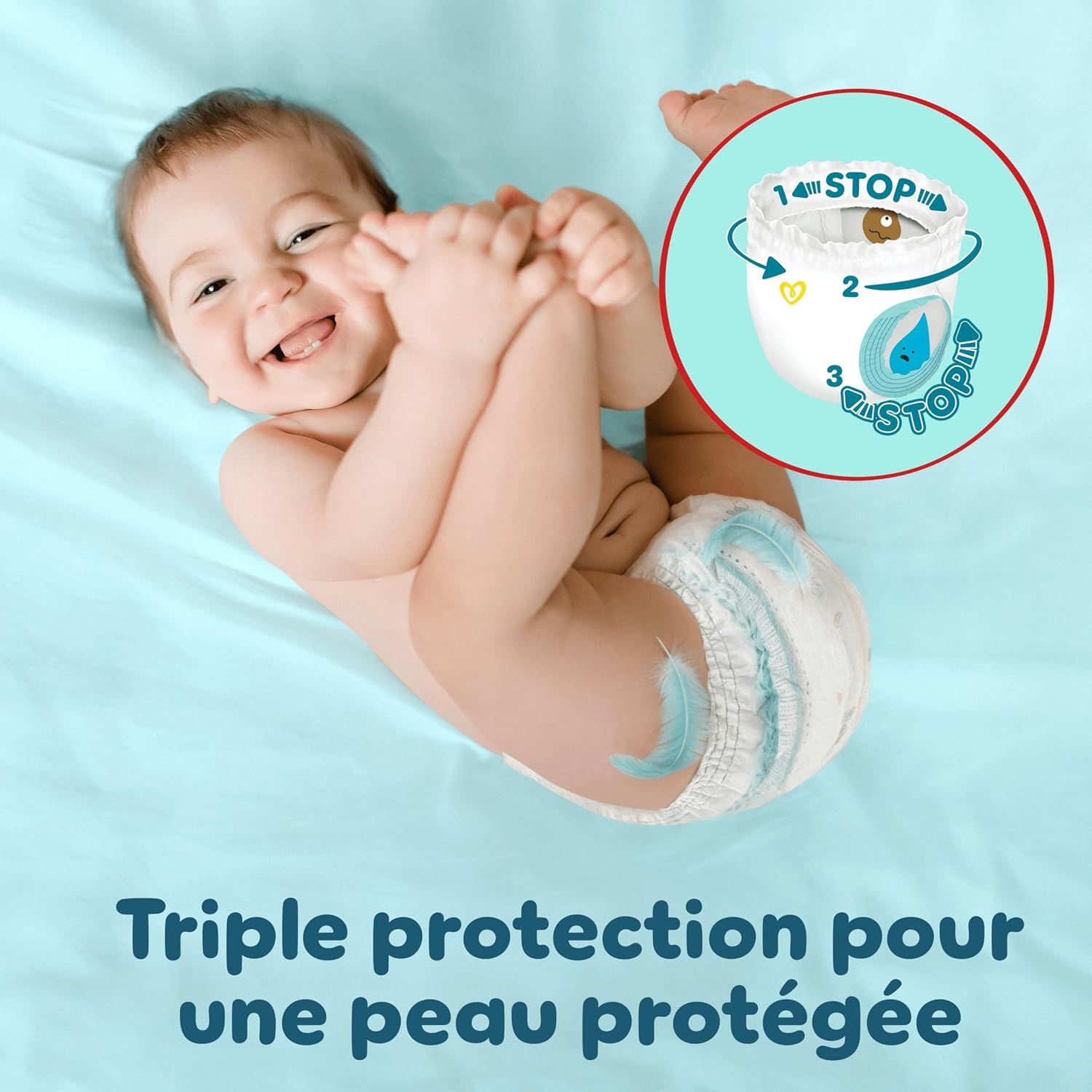 Couche pour bébé avec motif plume bleue et graphique circulaire montrant 3 niveaux de protection.