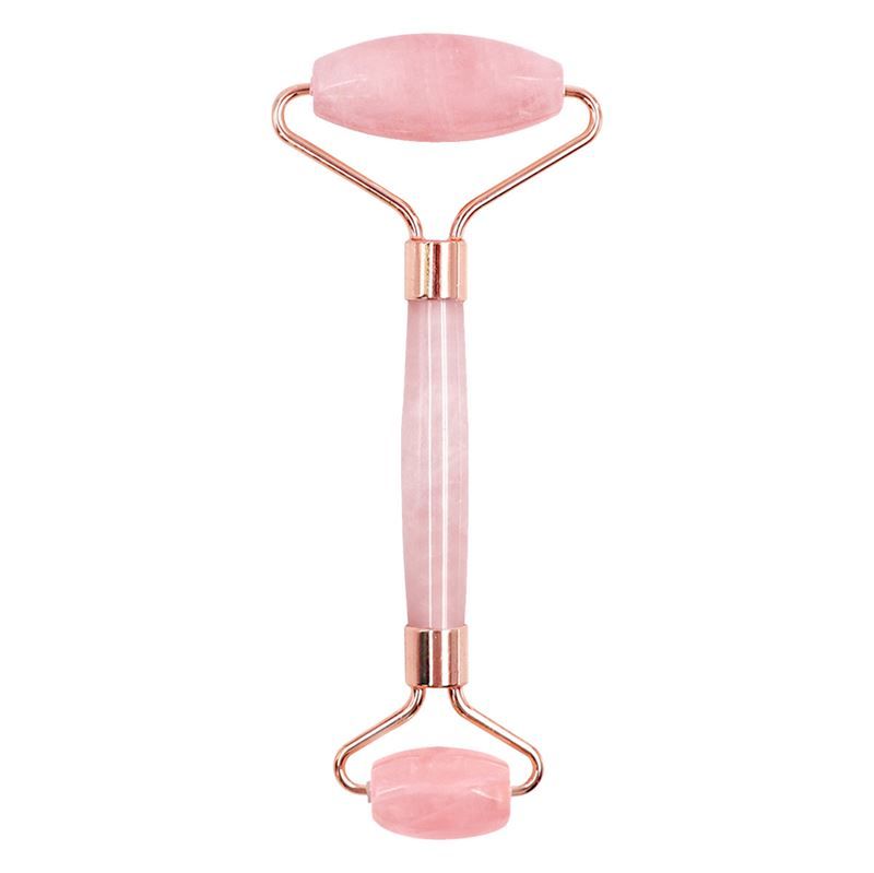 Rouleau facial en jade rose avec double rouleau et cadre plaqué or rose.