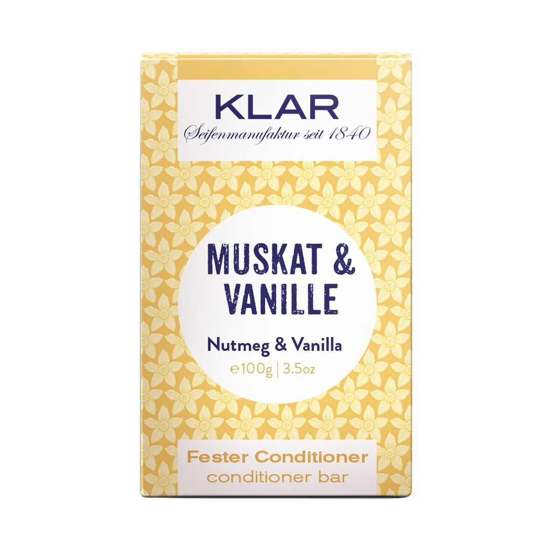 Emballage Klar à motifs floraux. Texte : Muskat & Vanille, Fester Conditioner. Marque Klar.