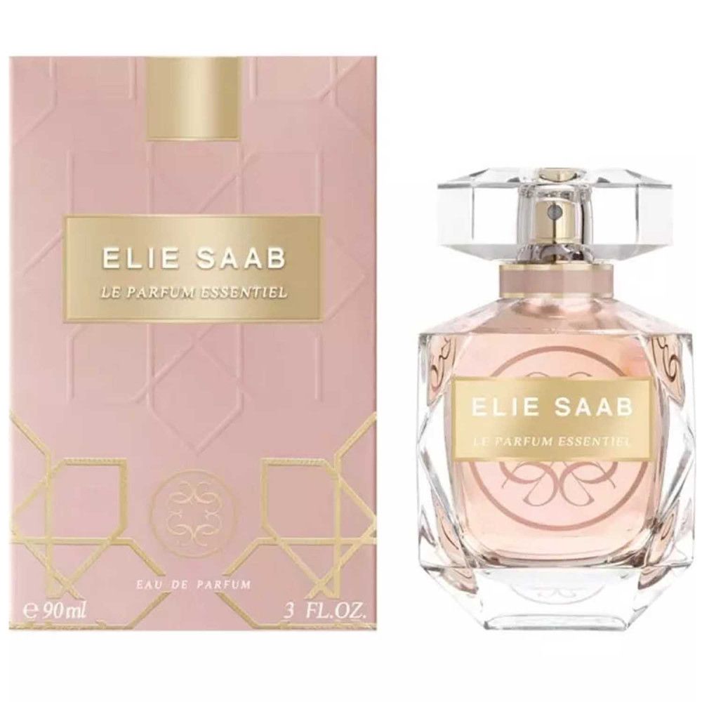 Roze parfumfles en verpakking. Opschrift: Elie Saab, Le Parfum Essentiel. Fles met kristallen dop.