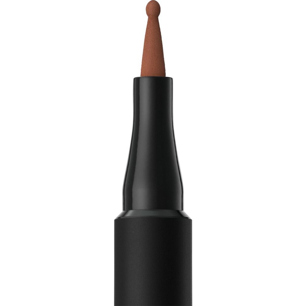 Een zwarte applicator met een bruine punt.