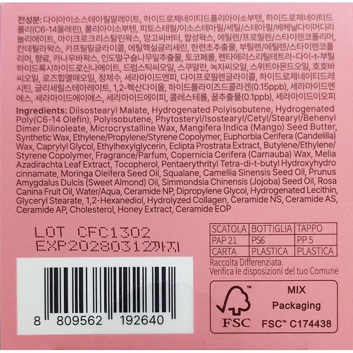 Ingrediëntenlijst en batchnummer op roze verpakking.