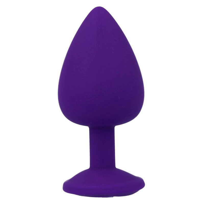 Plug anal violet de forme conique.