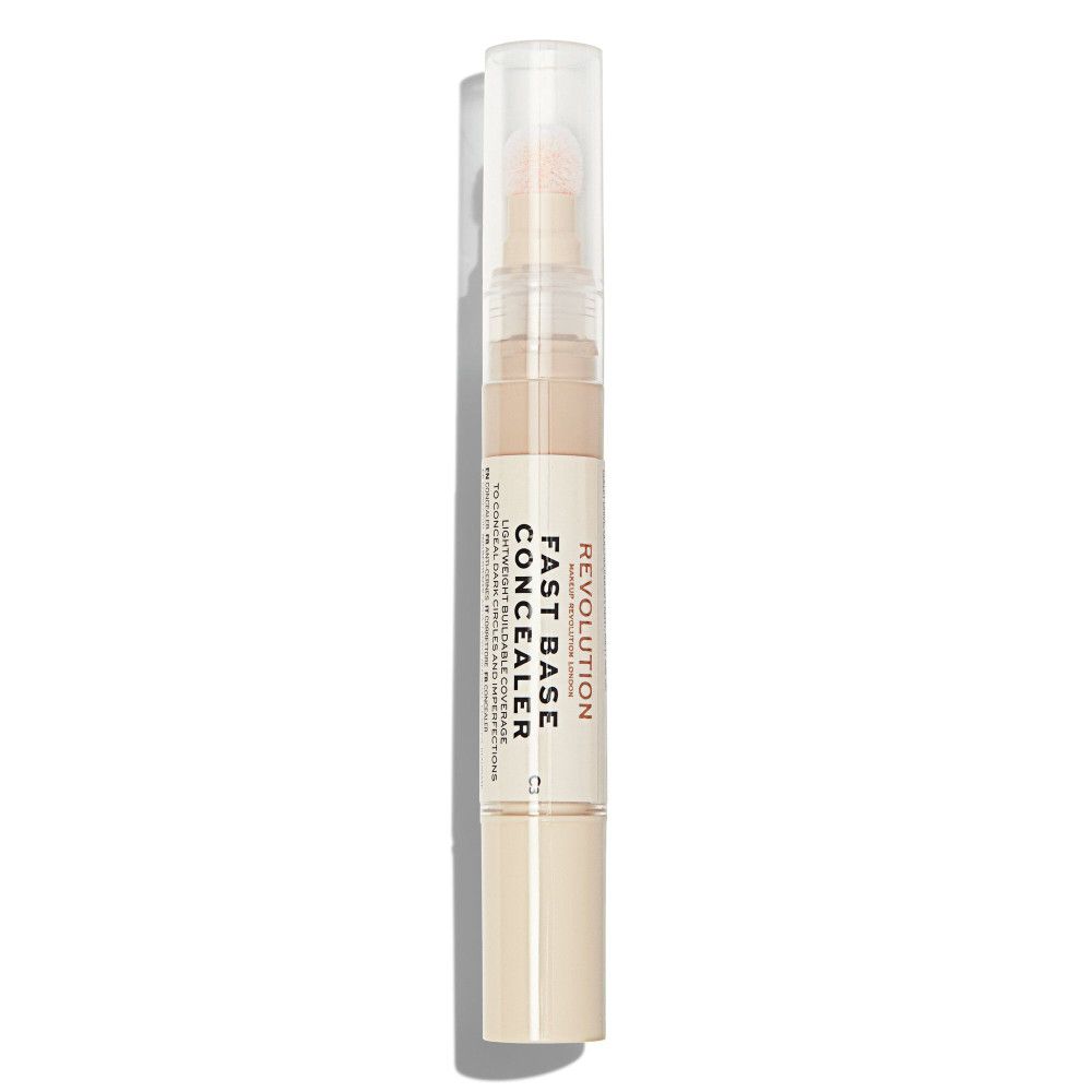 Concealer beige avec applicateur éponge. Inscription: Fast Base Concealer.