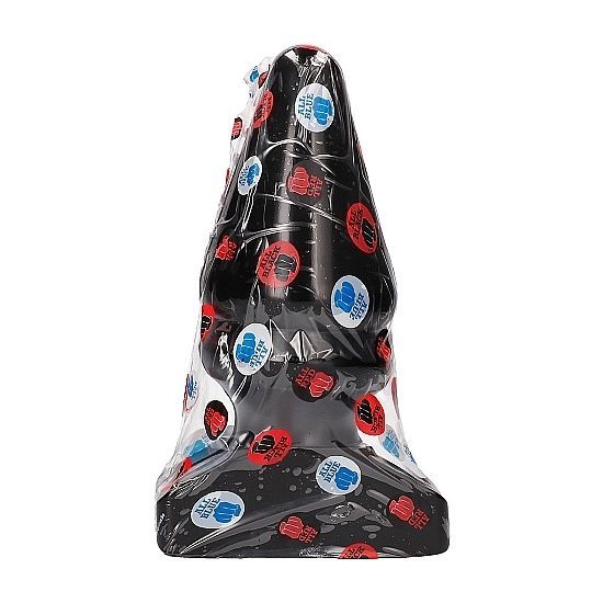 Bouchon anal noir conique, emballé dans du film avec des symboles rouges et bleus.