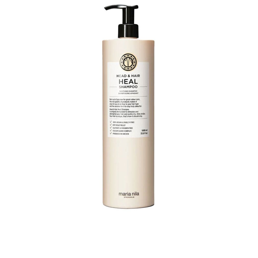 Beige shampoo fles met zwarte pomp. Opschrift: HEAD & HAIR HEAL SHAMPOO. Merk: Maria Nila.