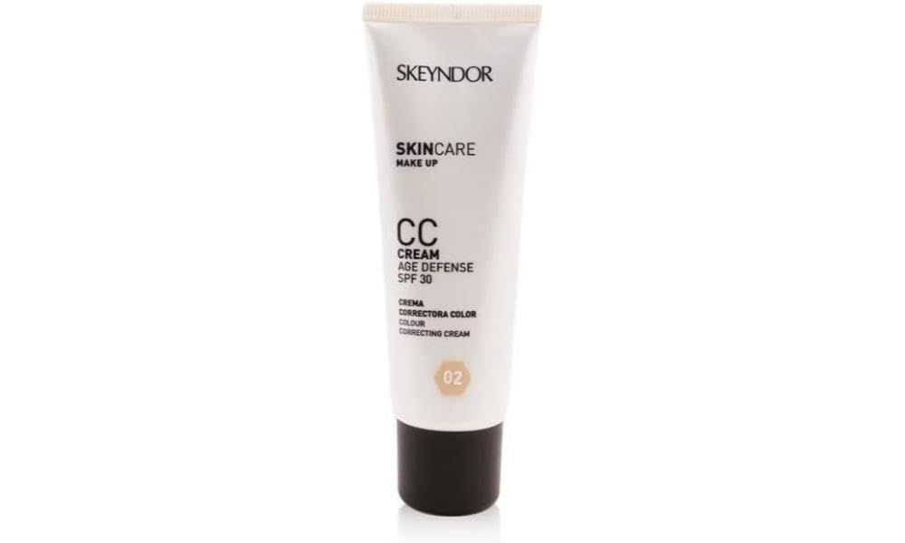 Crèmetube met Skeyndor SkinCare Make Up CC Cream Age Defense SPF30 02. Zwarte sluiting, beige tint.