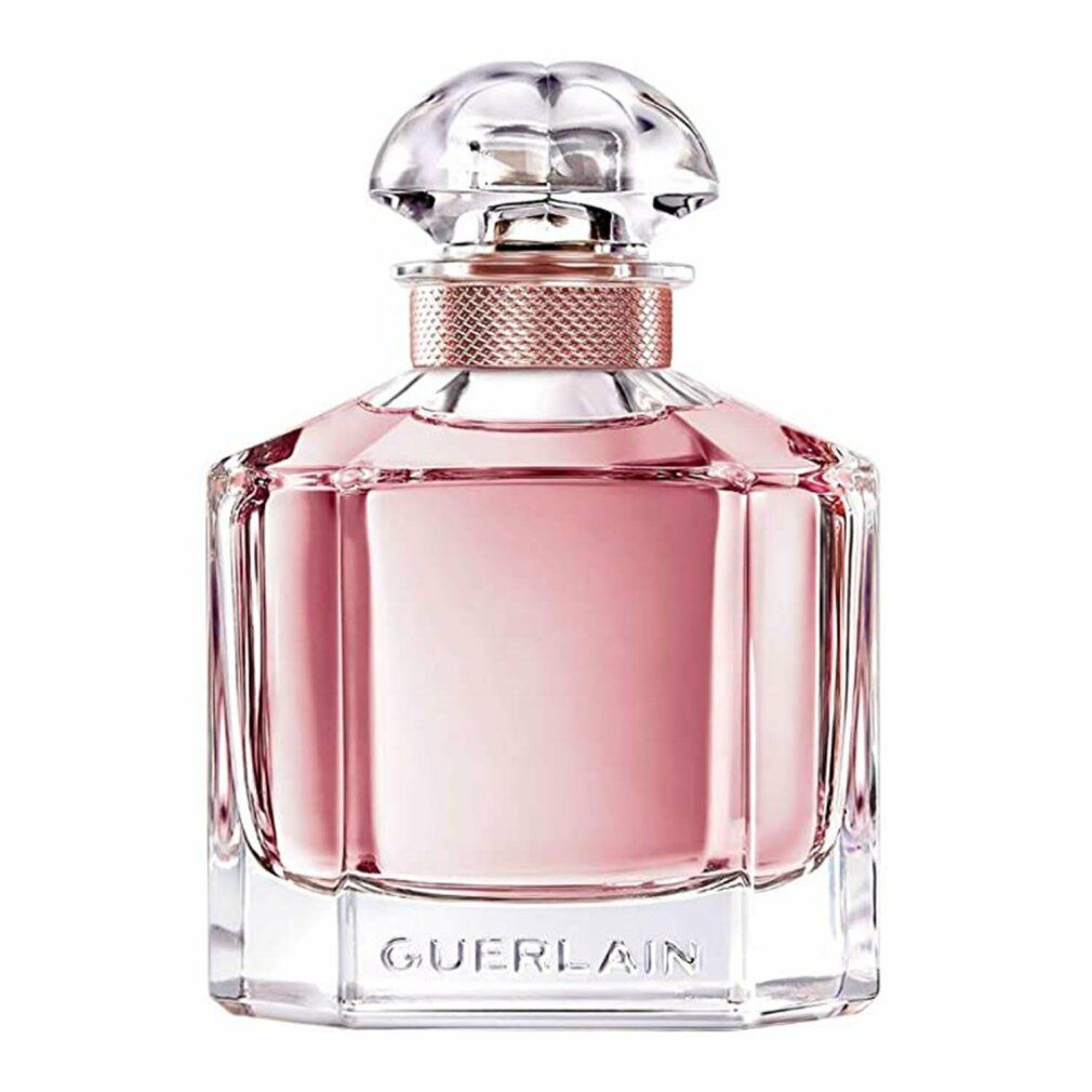 Parfumfles. Vierkante vorm, roze vloeistof, glazen dop. Tekst: Guerlain.