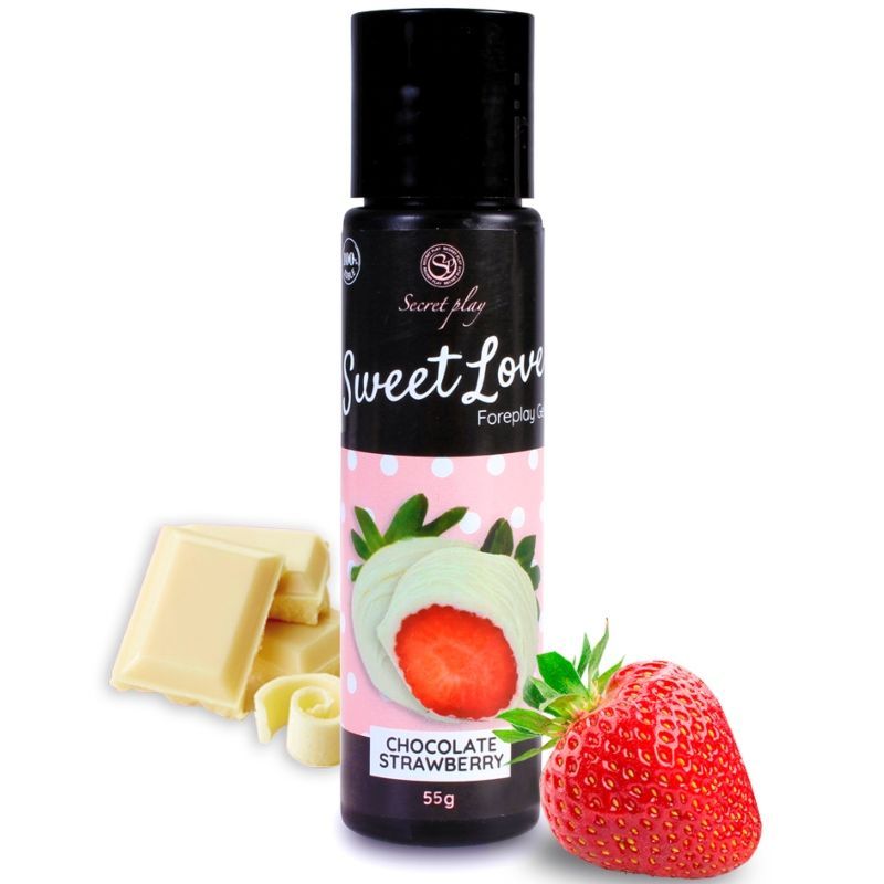 Fles chocolade aardbei glijmiddel, 55g. Stukken witte chocolade en aardbei ernaast.