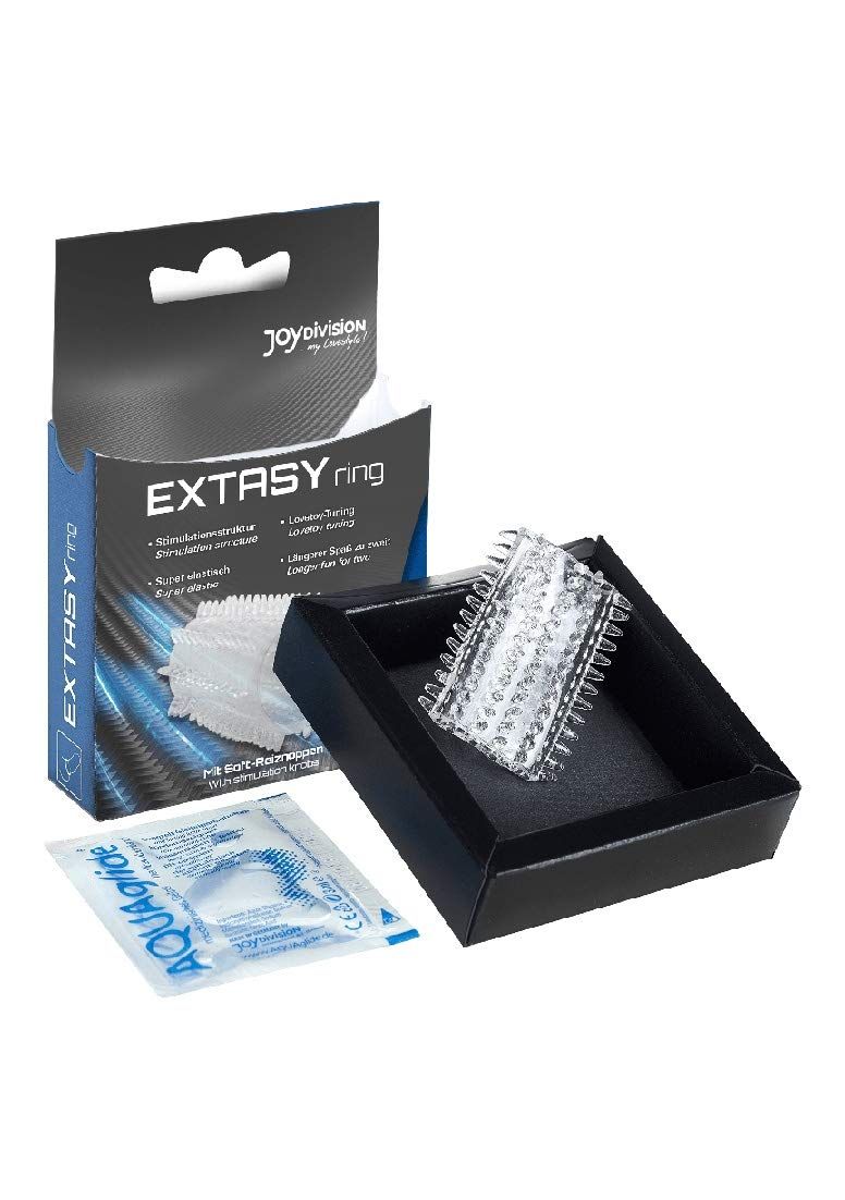 EXTASYring met stimulatiestructuur en Aquaglide-sachet in een zwarte geschenkdoos.
