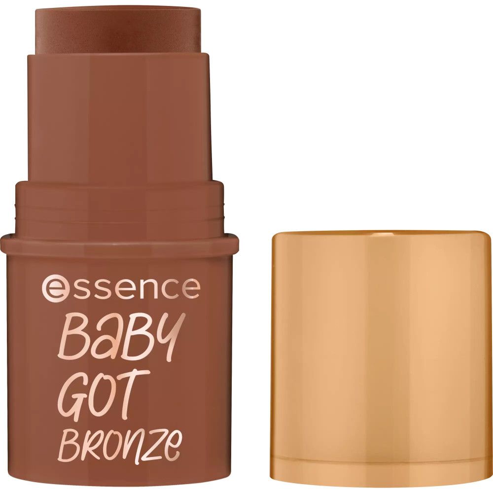 Stick bronzant marron avec capuchon doré. Inscription: Essence Baby Got Bronze.