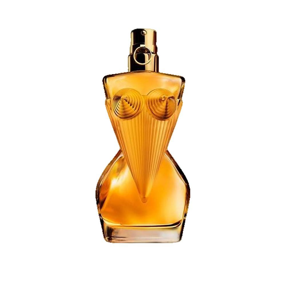 Parfumfles in de vorm van een vrouwenlichaam. Goudkleurig glas, goudkleurige dop. Fles staat rechtop.