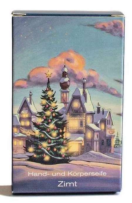 Emballage avec paysage hivernal, sapin de Noël et inscription "Hand- und Körperseife Zimt".