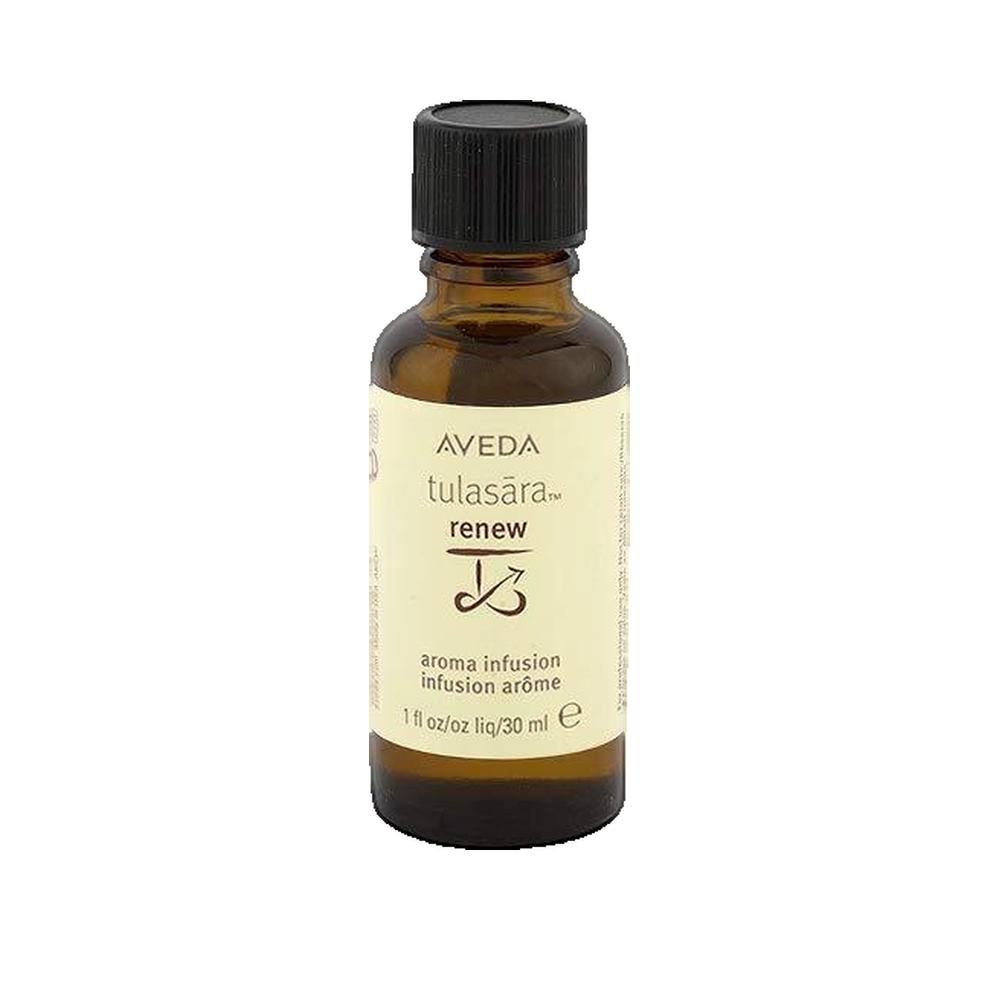 Flacon en verre brun avec bouchon noir. Inscription: AVEDA tulasāra renew. Infusion aromatique. 1 fl oz/30 ml.