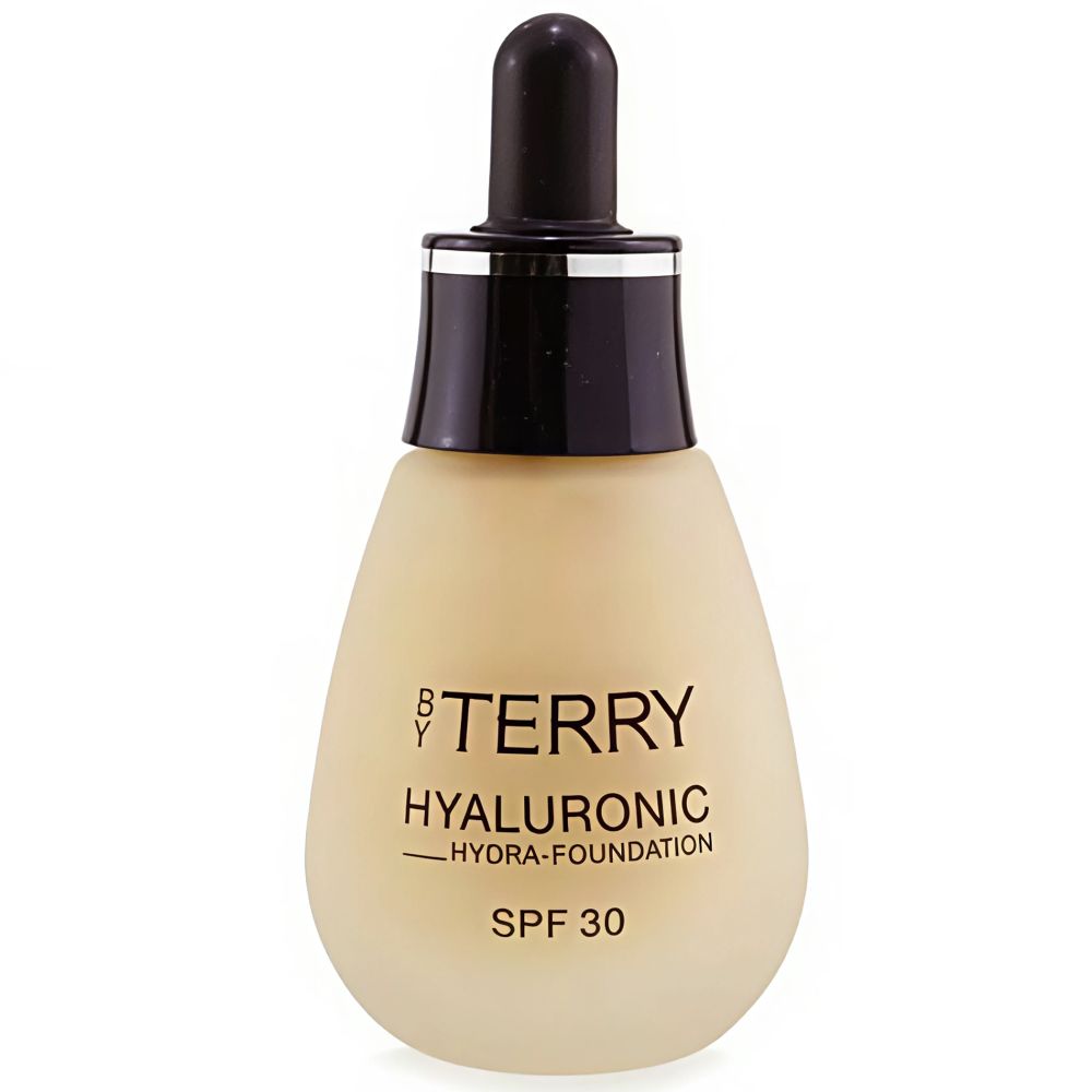 Beige foundationfles met zwarte dop. Opschrift: By Terry, Hyaluronic Hydra-Foundation, SPF 30.