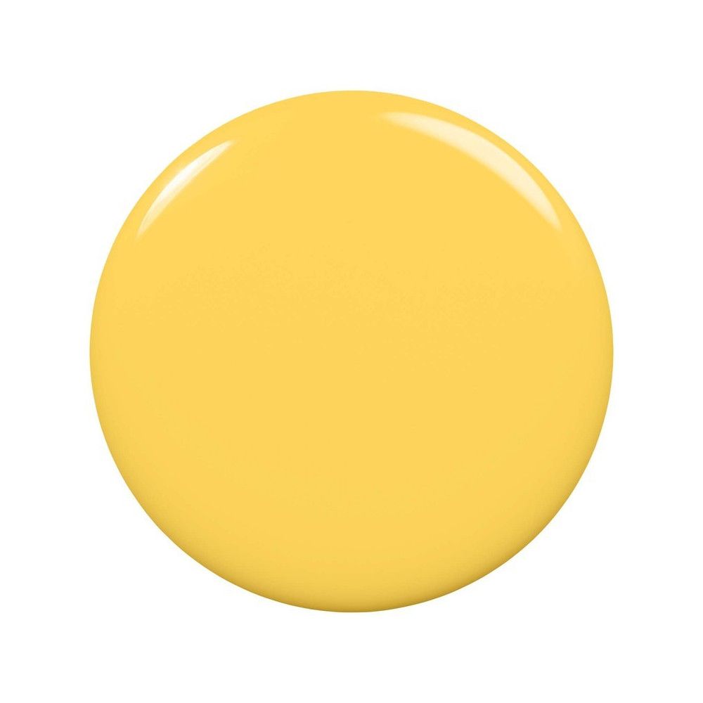 Gele nagellakvlek. Ronde vorm, glanzend oppervlak. Geen andere details.