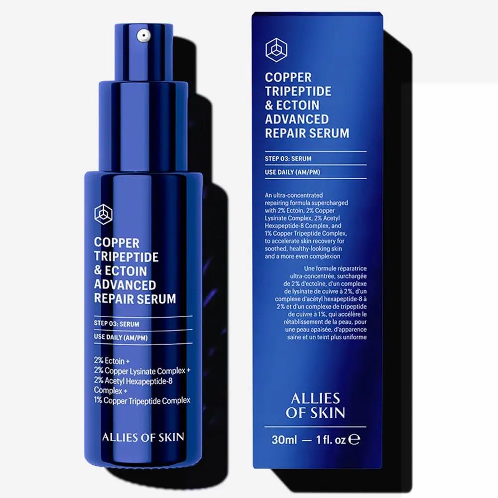 Blauwe metalen fles en doos. Tekst: Copper Tripeptide & Ectoin Advanced Repair Serum. Ingrediënten en gebruik.
