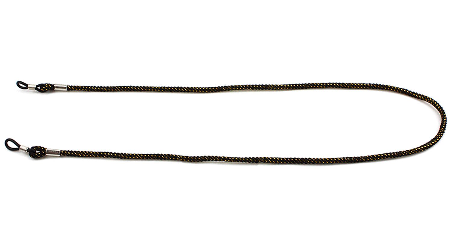 Zwart-goudkleurig gevlochten brillenkoord. Lussen voor bevestiging aan de pootjes. Metalen details.