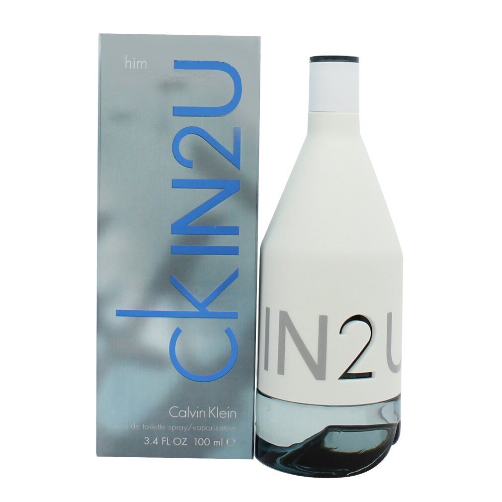 Fles en doos CK IN2U him. Fles wit, opschrift IN2U. Doos blauw-grijs met opschrift CKIN2U.