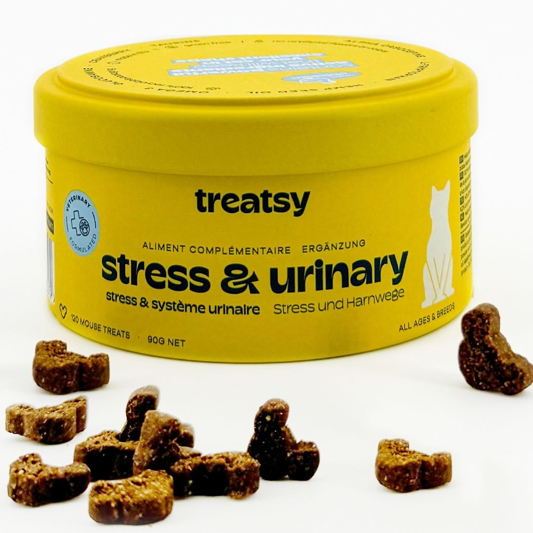 Boîte jaune « Treatsy Stress & Urinary ». Friandises marron en forme de souris.