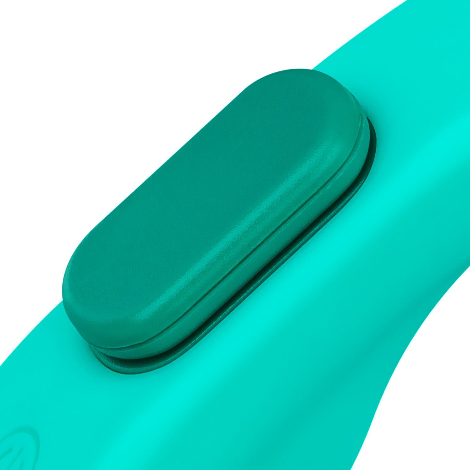 Gros plan d'un bouton vert sur un produit de bien-être turquoise.