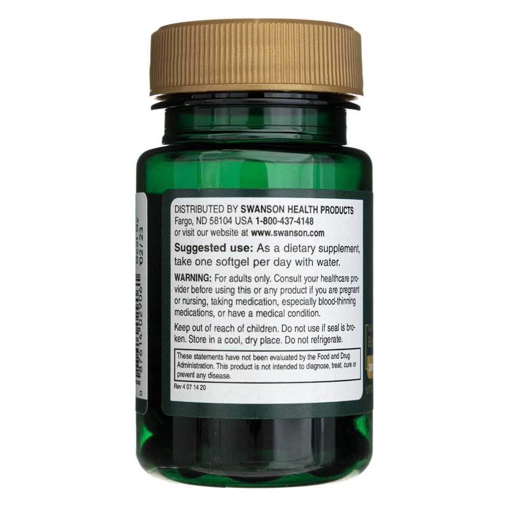 Arrière d'une bouteille verte de Swanson Real Food K2, adresse de distribution et avertissements.
