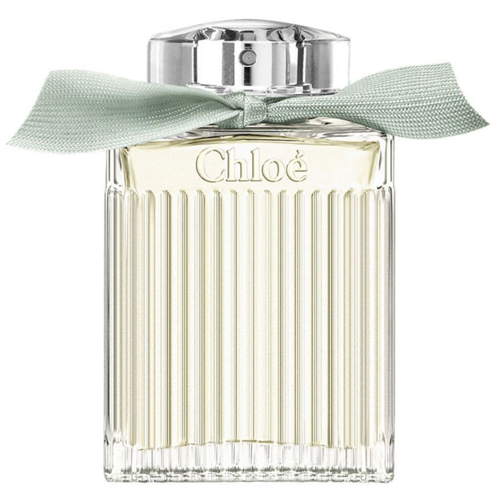 Chloé parfumflesje met groen lint. Vierkant, geribbeld glazen flesje met zilveren dop.