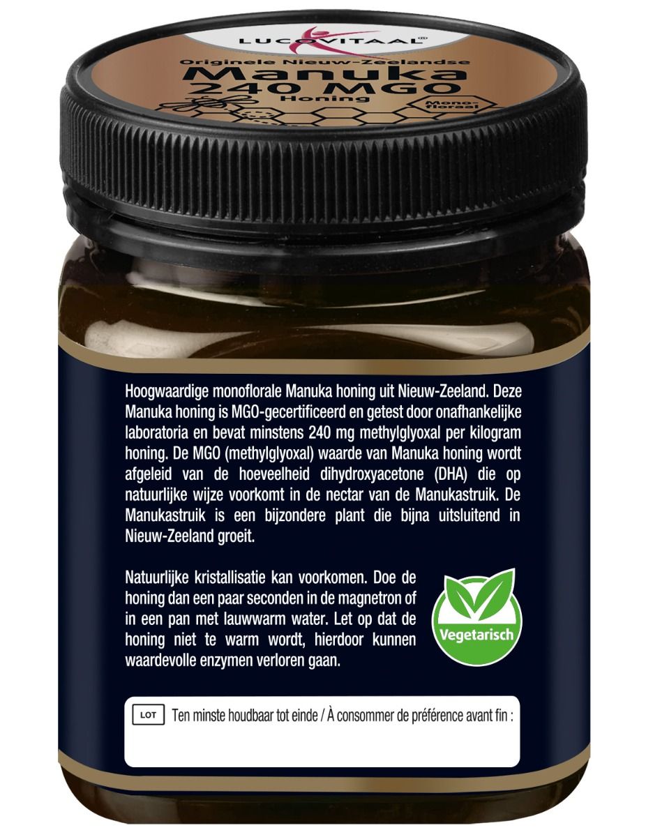 Bruine pot met zwarte deksel. Etiket met informatie over Manuka honing. Bevat het 'Vegetarisch' logo.