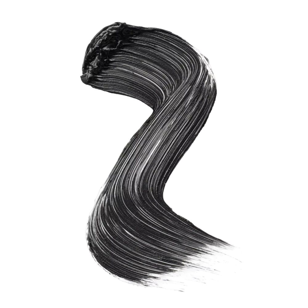 Trait de mascara noir sur fond blanc. La texture est lisse et ondulée.