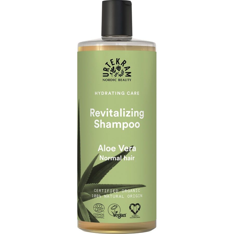 Groene shampoo fles met zwarte dop. Opschrift: Revitalizing Shampoo, Aloe Vera, normaal haar. Certificeringen.