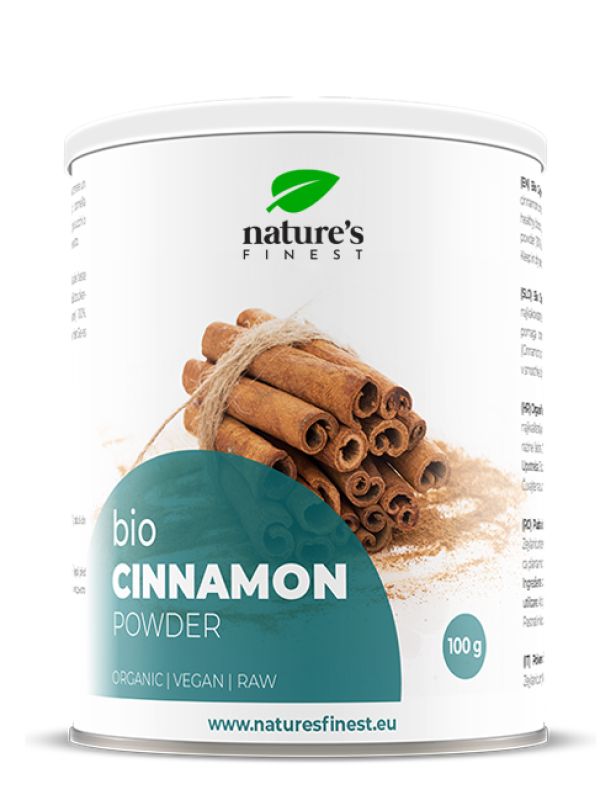 Witte pot met groen etiket. Opschrift: "Nature's Finest", "Bio Cinnamon Powder", "Organic | Vegan | Raw". 100g.