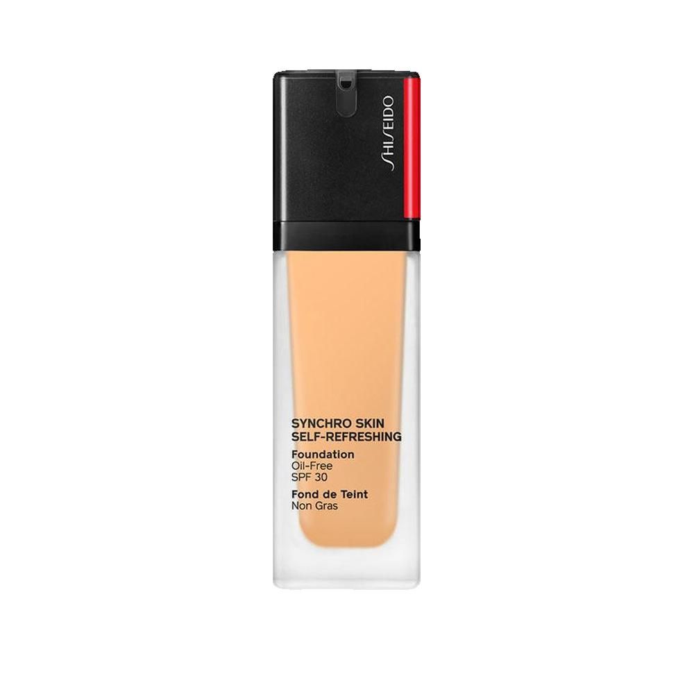 Flacon de fond de teint. Bouchon noir, flacon transparent. Inscription: Synchro Skin Self-Refreshing Foundation SPF 30.