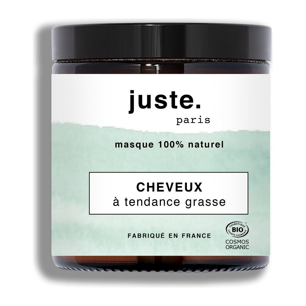 Een pot met etiket 'juste. paris', 'masque 100% naturel', 'CHEVEUX à tendance grasse'.