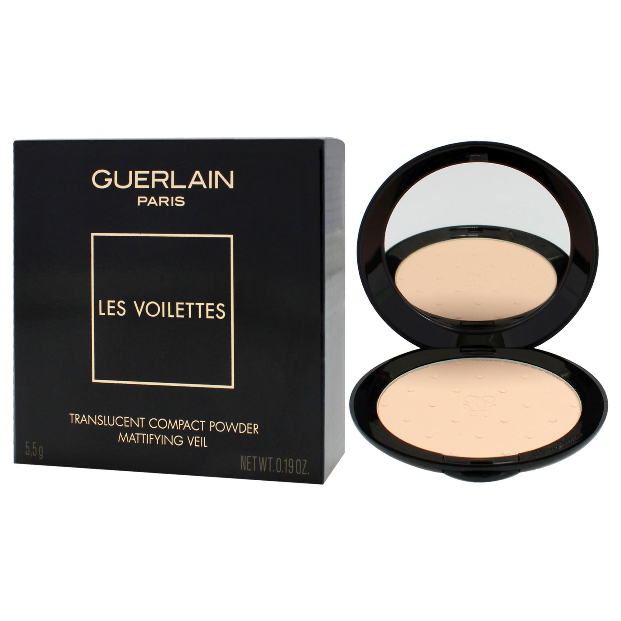 Poudre compacte avec miroir. Boîtier noir ouvert. Poudre beige clair. Texte: Guerlain, Les Voilettes, Translucent Compact Powder, Mattifying Veil.