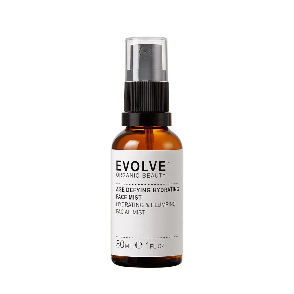 Bruine glazen fles met pompspray, 30ml. Etiket: EVOLVE ORGANIC BEAUTY AGE DEFYING HYDRATING FACE MIST.