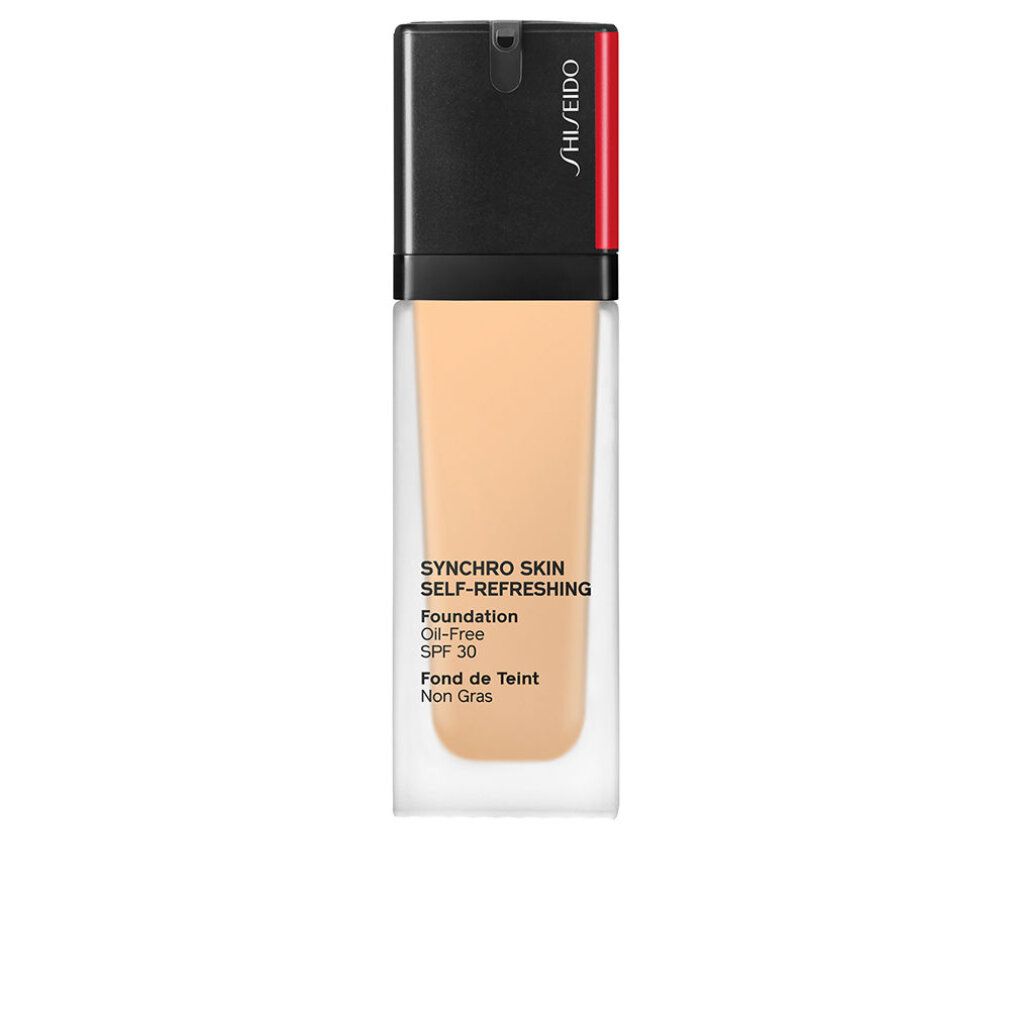 Flacon de fond de teint. Bouchon noir, accent rouge. Texte: Synchro Skin Self-Refreshing Foundation, Oil-Free, SPF 30, Fond de Teint Non Gras.