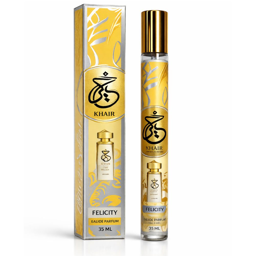 Flacon de parfum et emballage. Bouchon doré, emballage jaune avec inscription 'Khair Felicity'.