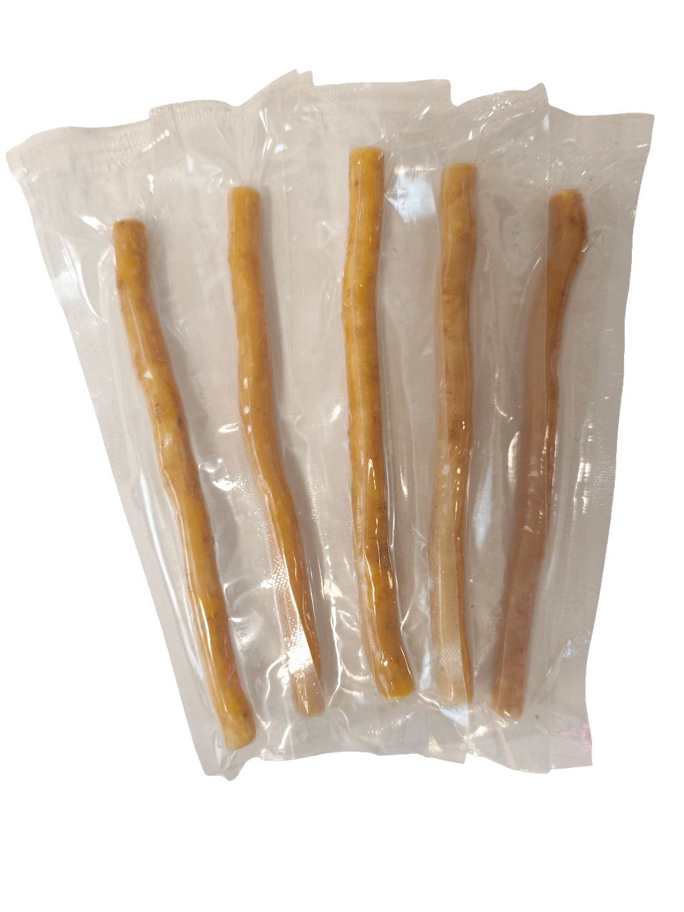 Cinq bâtonnets de siwak dans un emballage transparent. Couleur naturelle, forme irrégulière.