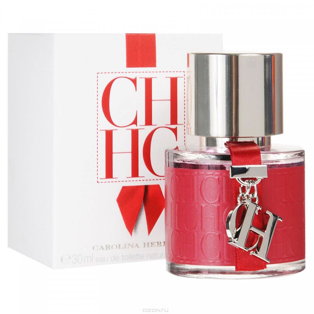 Flacon rouge avec bouchon argenté et breloque. Boîte blanche avec logo et texte rouges.