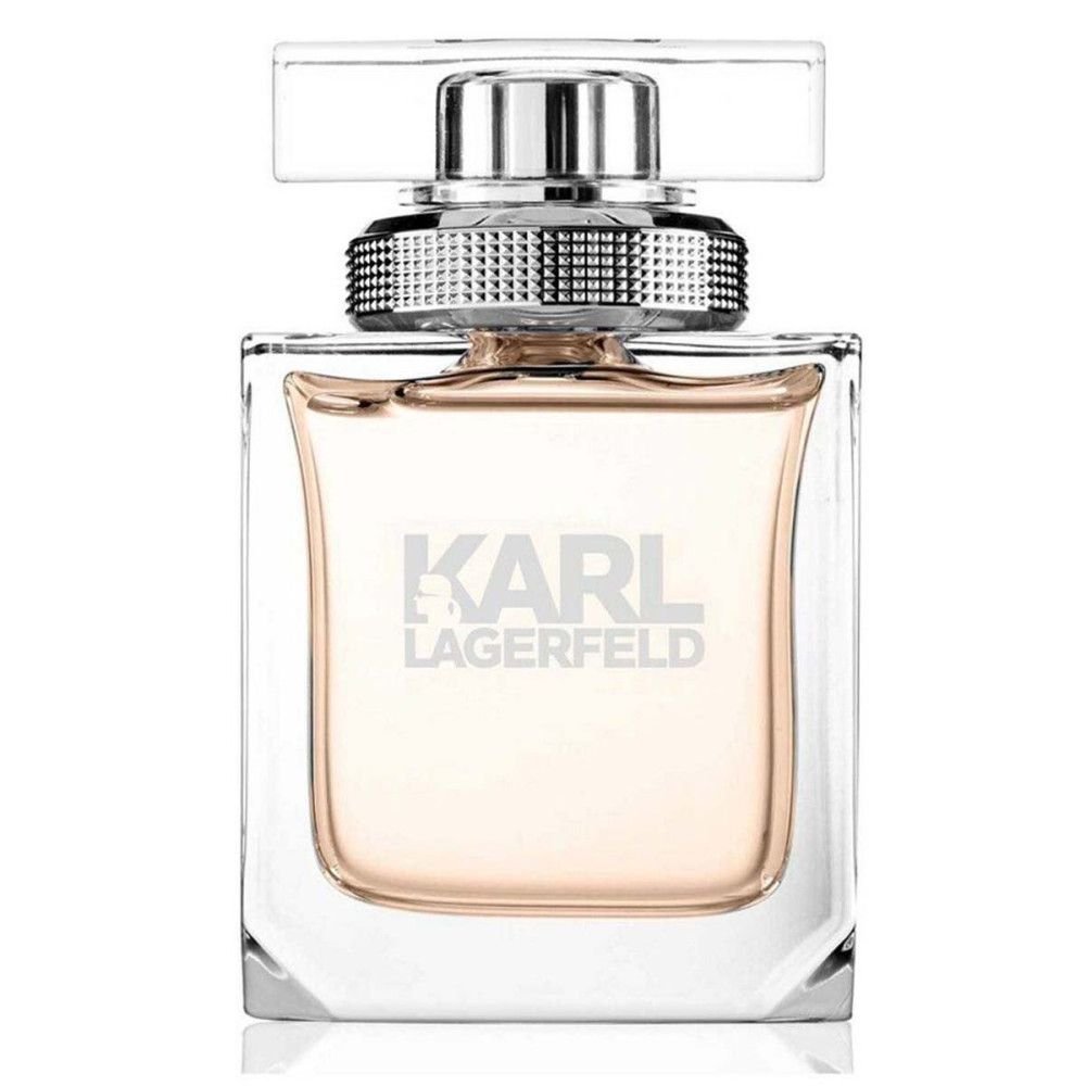 Flacon de parfum, carré, transparent, avec bouchon argenté. Logo sur le flacon. Contenu rose. Sur fond blanc.