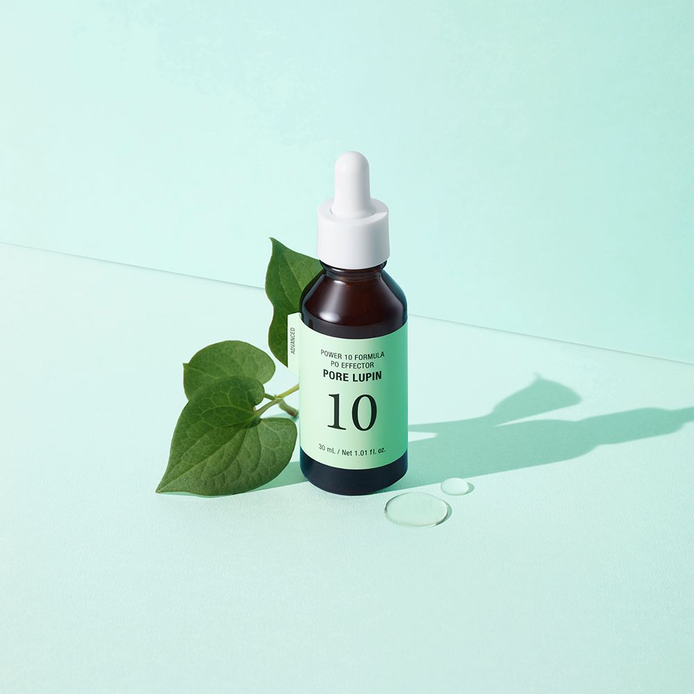 Bruine fles met pipet, groen etiket. Opschrift: Power 10 Formula PO Effector Pore Lupin 10. Bladeren.