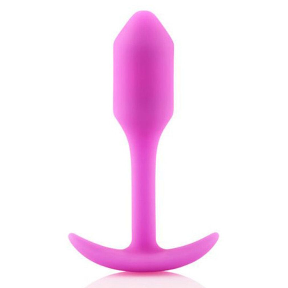Plug anal violet avec une large base et un poids intégré, isolé.