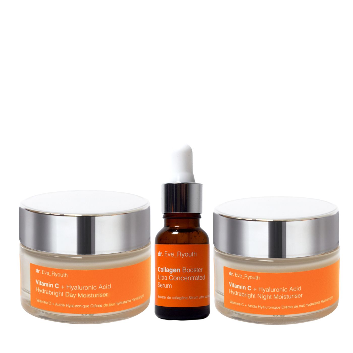 Twee crèmes en een serum. Opschriften: dr.Eve_Ryouth, Vitamin C + Hyaluronic Acid. Serum met pipet. Crèmes met deksels.
