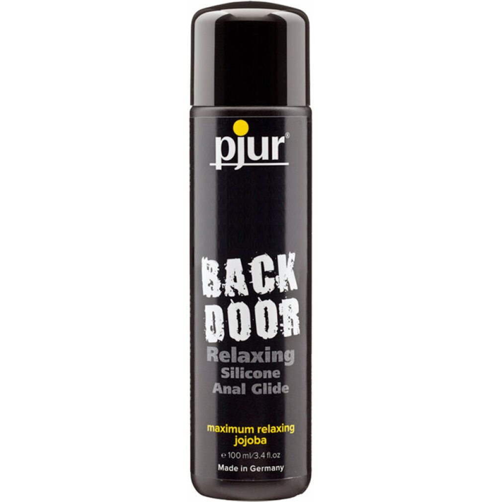 Zwarte fles met geel logo. Opschrift: BACK DOOR Relaxing Silicone Anal Glide. Met jojoba. 100 ml. Gemaakt in Duitsland.