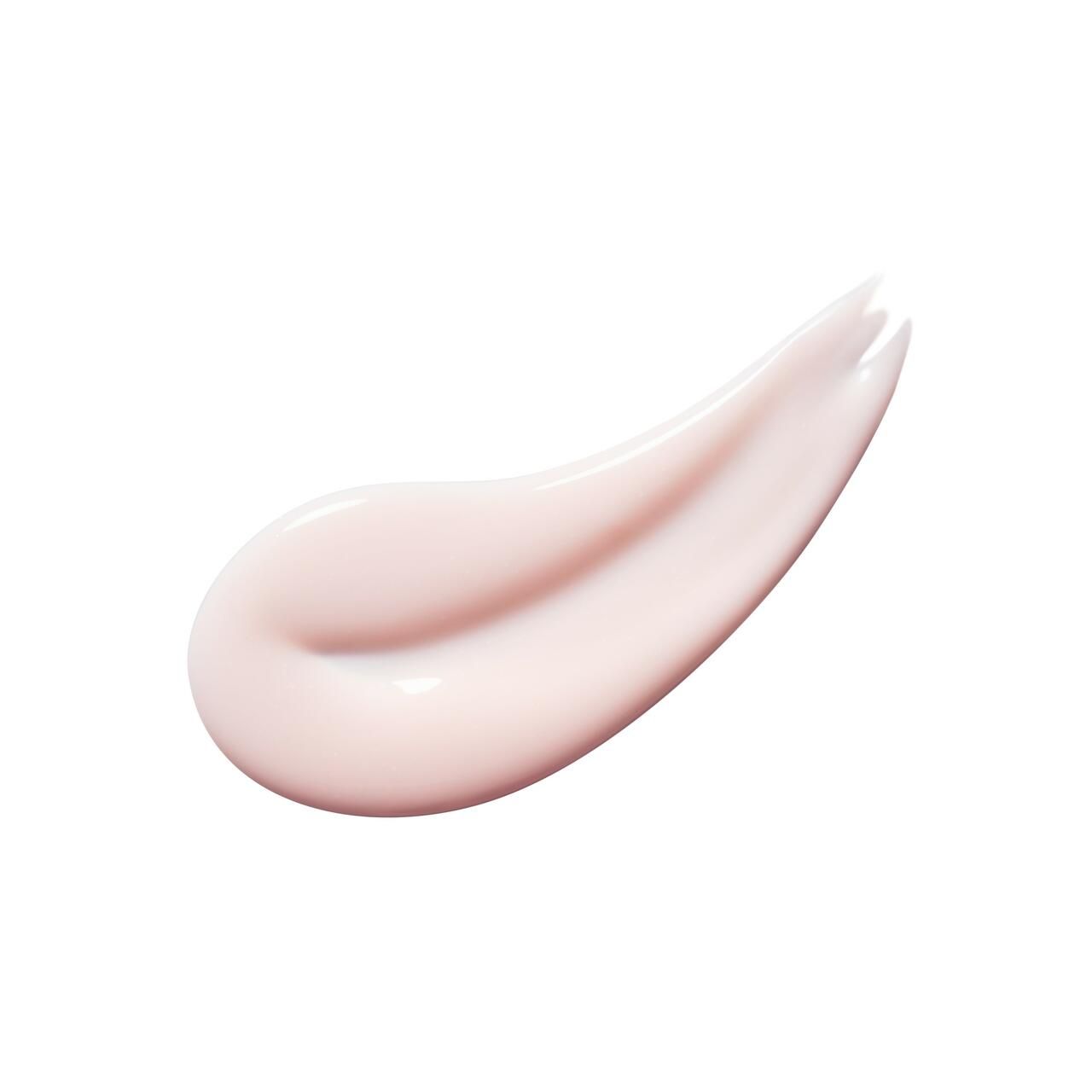 Étalement de crème rose sur fond blanc. La texture est lisse et brillante.