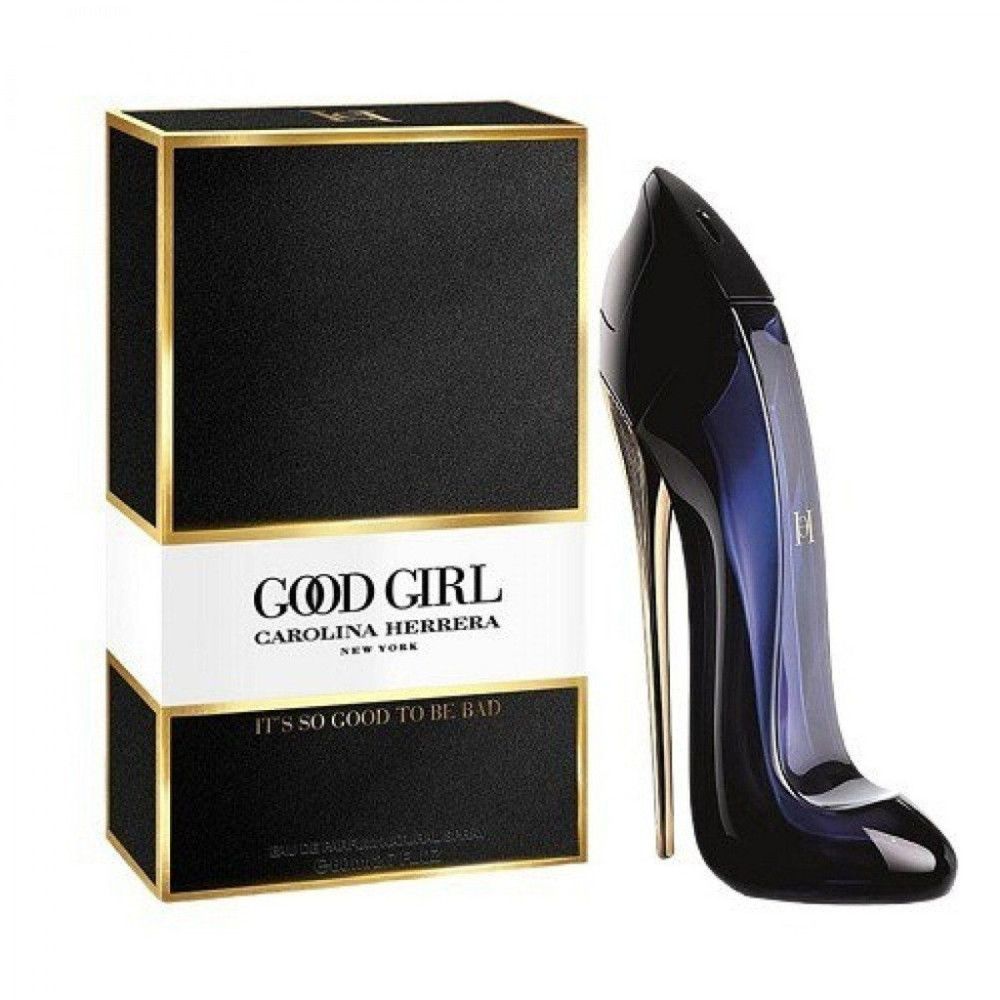 Boîte noire avec bordure dorée et inscription 'Good Girl Carolina Herrera'. À côté, un flacon en forme d'escarpin.