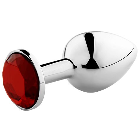Bouchon anal en métal brillant avec une pierre rouge facettée sur la poignée.