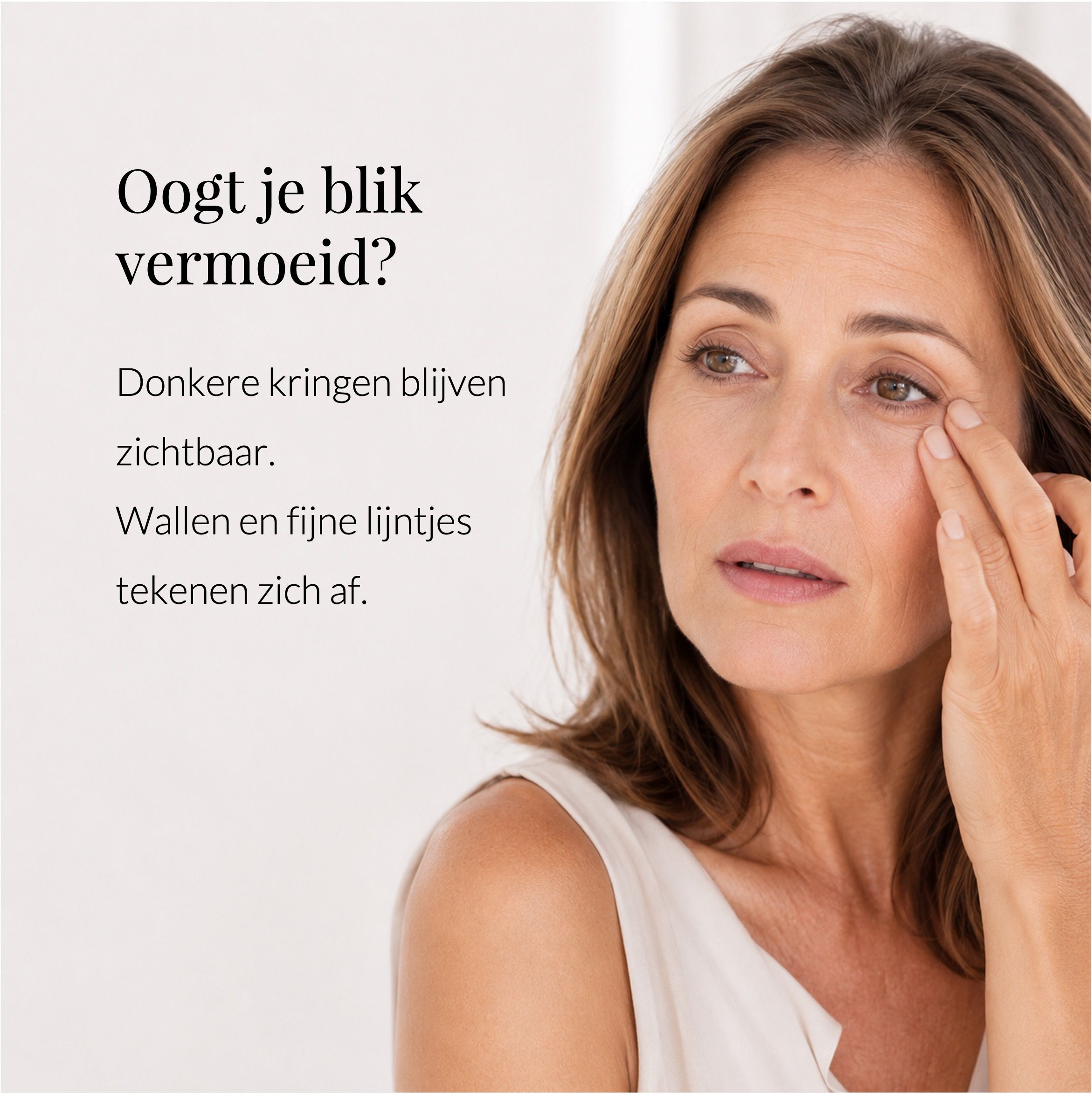 Vrouw raakt haar oog aan. Tekst: Oogt je blik vermoeid? Product: ANTI-AGING EYE CONTOUR CREAM.